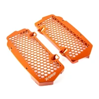 X-GRIP КРИШКИ РАДІАТОРА (КОМПЛЕКТ) KTM SXF/XCF/XC '23-, EXCF/XC-W/XCF-W '24-, HUSQVARNA TC/FC/FX/TX '23-, GASGAS ECF/MCF/EXF '24-, КОЛІР КОЛІР ПОМАРАНЧ (PATRZ ОПИС ТОВАРУ)